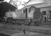BR Standard class 3 2-6-2T no 82018 on shed at Nine Elms in October 1964.<br><br>[K A Gray 23/10/1964]