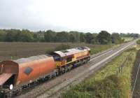 EWS 66200 eastbound from Woodborough on 12 October with a stone train. <br>
<br><br>[Peter Todd 12/10/2011]