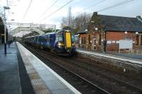 380 013 draws to a stop at Bishopton with a Glasgow bound service on 27 November.<br><br>[Ewan Crawford 27/11/2011]