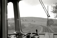 View west from a train showing Balnacraig Viaduct on the former Royal Deeside line in the summer of 1962. The 1857 structure, which spanned  the Beltie Burn just west of Torphins, Aberdeenshire, was also referred to as Sundayswells, Lumphanan and Beltie Burn Viaduct. Demolition was carried out in June 1989.<br><br>[R Sillitto/A Renfrew Collection (Courtesy Bruce McCartney) 07/07/1962]