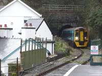 158820 leaves the east side of Aberdovey No 4 tunnel as it approaches Penhelig on 6 December with a Pwllheli - Machynlleth service. <br><br>[David Pesterfield 06/12/2011]