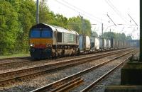 An Anglo-Scottish Intermodal service heads north through Euxton on 29 April 2011 with DRS 66418 in charge.<br><br>[John McIntyre 29/04/2011]