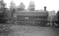 Ex-GWR 0-6-0PT 3749 stands in the yard at Tyslely shed in September 1958.<br><br>[Robin Barbour Collection (Courtesy Bruce McCartney) 28/09/1958]