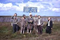 Taking a quick break from the 100th anniversary special train on the Far North line in 1974, this official party includes the BR Area Manager Thurso (far right), David Cobbett the BR Scotland General Manager (third right), Lord Thurso (centre, in kilt) and David Martin, SAPT rail campaigner from Inverness (second left).<br><br>[David Spaven //1974]