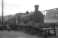 J36 0-6-0 no 65234 survives as a stationary boiler at St Margarets shed in the summer of 1966. The 0-6-0 was officially withdrawn by BR in April 1967 and was eventually cut up at Motherwell Machinery and Scrap, Wishaw, in August that year. [See image 23124]<br><br>[David Spaven //1966]
