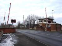 Low Gates level crossing and signal box at Northallerton in February 2012. View north west along the A167 over the Yarm and Eaglescliffe line.<br><br>[David Pesterfield 12/02/2012]