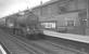 Class J39 0-6-0 no 64806 runs east on the North Tyneside electrified line through Walkergate station, between Heaton and Wallsend with empty stock in the early sixties. The building behind the station is Walkergate carriage works.<br><br>[K A Gray //]