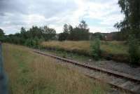 Looking south west across the remains of the platforms at Nelson and Llancaiach. Much of the route of the Taff Vale Extension in this area is now a cyclepath and I had a very pleasant cycle along the route that day in 2002.<br><br>[Ewan Crawford /09/2002]