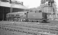 Rebuilt Merchant Navy Pacific no 35014 <I>Nederland Line</I> standing in the shed yard at Nine Elms in the 1960s. The locomotive was withdrawn in March 1967.<br><br>[K A Gray //]