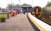 An afternoon Inverness - Aberdeen service calls at Forres on 25 May 2012.<br><br>[John Furnevel 25/05/2012]