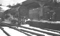 Patriot no 45531 <I>Sir Frederick Harrison</I> looking a little out of place following arrival at a snowy Newcastle Central sometime during the winter of 1962/63. No details of the working are available - possibly a football special(?)<br><br>[K A Gray //]