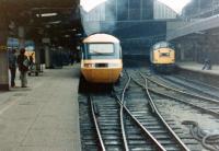 An InterCity 125 HST stands at Newcastle Central in 1981, flanked by a pair of class 40 locomotives.<br><br>[Colin Alexander //1981]