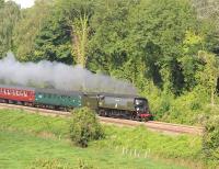 Bulleid unrebuilt 'Battle of Britain' Pacific no 34067 <I>'Tangmere'</I> passing Avoncliff Station on the Bath to Westbury line on 19 August 2012  with 'The Weymouth Seaside Express'.<br><br>[Peter Todd 19/08/2012]
