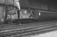 One of Gateshead shed's class J72 0-6-0Ts no 68723, specially repainted for station pilot duties at Newcastle Central, shunts a TPO in the station on 17 June 1961.<br><br>[K A Gray 17/06/1961]