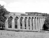 D3888 hauls the last freight over Leaderfoot Viaduct. Photographed on Friday 16 July 1965 on its way back from Greenlaw to St Boswells.<br><br>[Bruce McCartney 16/07/1965]