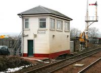 The signal box at the north end of New Cumnock station, photographed on a chilly 29 March 2006, with traces of a recent snowfall in evidence. <br><br>[John Furnevel 29/03/2006]