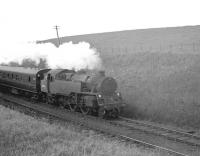 Scene on the Largs branch near West Kilbride in 1962 featuring Corkerhill shed's Standard Class 4 2-6-4T no 80045.<br><br>[R Sillitto/A Renfrew Collection (Courtesy Bruce McCartney) //1962]