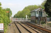 The line towards Sleaford, as seen from the south end of the rebuilt platforms at Metheringham station. Blankney signalbox can be seen protecting the level crossing, its name dating from when the station was known as Blankney and Metheringham.<br><br>[Mark Bartlett 21/05/2012]