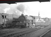 J94 0-6-0ST no 68075 stands alongside A1 Pacific 60130 <I>Kestrel</I> at the south end of Doncaster station in July 1961.<br><br>[K A Gray 29/07/1961]