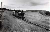 64615 heading south past North Water Bridge Halt with the 1960 RCTS/SLS Joint Scottish Tour. The train is about to cross the North Water Bridge Viaduct.<br><br>[WA Camwell (Copyright Stephenson Locomotive Society) 16/06/1960]