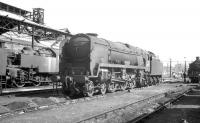 Rebuilt Bulleid <I>West Country</I> Pacific no 34025 <i>Whimple</i> stands in the shed yard at 70A Nine Elms in the 1960s. The locomotive was eventually withdrawn from Bournemouth shed in July 1967.<br><br>[K A Gray //]