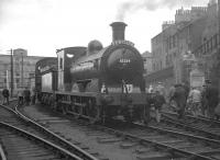 Saturday 29 August 1964 was the day of the SLS/BLS J36 Railtour. The special, which was hauled throughout by 65234, visited selected branch lines in and around Edinburgh.  The train is seen here at North Leith with participants returning to their seats prior to departure on the next leg of the tour to Penicuik [see image 23124].<br><br>[K A Gray 29/08/1964]