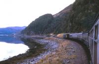 The railway deviation caused by the landslip-prone new A890 road is just apparent ahead of this train east of Strome Ferry in Summer 1974.<br><br>[David Spaven //1974]