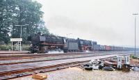 DB 043 121 + 043 903 take a lengthy freight through Leschede on 25 June 1977.<br><br>[Peter Todd 25/06/1977]