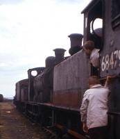 Not quite ready for the road - the photographer's sons play trains on J83 No.68479 on the scrap line at Bo'ness in Apriil 1963.  The Holmes 0-6-0T, dating from 1901, had been withdrawn from Eastfield shed the previous October.<br><br>[Frank Spaven Collection (Courtesy David Spaven) /04/1963]