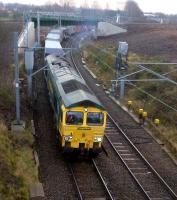 66565 pulls a Saturday morning Freightliner container train towards Birmingham (Hams Hall) away from a signal stop on 8 December - it was held for an Eastbound Turbostar.<br><br>[Ken Strachan 08/12/2012]