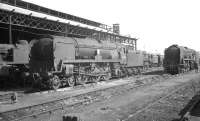 A section of the shed yard at Nine Elms, photographed in the 1960s, with rebuilt Bulleid West Country Pacific no 34008 <I>'Padstow'</I> nearest the camera.<br><br>[K A Gray //1967]