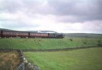A southbound train on Shap heading for Tebay in the 1960s behind an unidentified Stanier Coronation Pacific.<br><br>[Robin Barbour Collection (Courtesy Bruce McCartney) //]