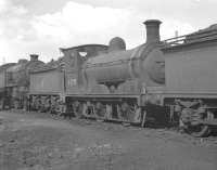 Ex-North British J36 0-6-0 no 65295, a veteran of 1897, stabled alongside Parkhead shed in April 1961, the same month as its withdrawal by BR.<br><br>[K A Gray 03/04/1961]
