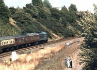 4468 <I>Mallard</I> runs past the site of Thornhill station near Dewsbury heading east towards Wakefield in July 1988 on one of its 50th Anniversary Celebration workings. <br><br>[David Pesterfield 31/07/1988]