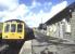 A DMU for Barry Island stands at Rhymney in September 1986.<br><br>[Ian Dinmore /09/1986]