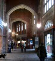 Ye Olde WHS: the entrance to Temple Meads from Brunel's train shed looks rather like something that Henry VIII would have set fire to - a monastery, that is. Notice the alien dog on the left.<br><br>[Ken Strachan 10/02/2013]
