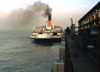 The BR Paddle Steamer <I>Lincoln Castle</I> about to leave New Holland Pier in 1975 with the Humber Ferry bound for Hull. [See image 31915]<br><br>[Ian Dinmore //1975]
