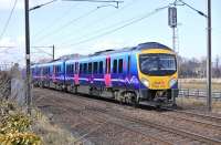 A diverted Edinburgh - Manchester Airport TransPennine service formed by 185119 nears St Germains level crossing on 6 April 2013.<br><br>[Bill Roberton 06/04/2013]