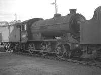 J38 0-6-0 no 65912, carrying a 62C Dunfermline shedplate, photographed at Eastfield in the summer of 1966.<br><br>[K A Gray //1966]