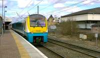 Arriva 175008 on a Manchester Piccadilly to Llandudno service leaves Warrington Bank Quay on 18 April.<br><br>[Ken Browne 18/04/2013]