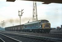 By 1970, the 13.43 Aberdeen to Kings Cross express freight (4E47) is thought to have been the last regular fish train to be operated by BR. Despite a modest load of just ten or so Blue Spot vans it was still considered important enough to qualify for Type 4 haulage. On 13 April 1970 Peak No. D187 is seen accelerating off the reverse curves at Portobello and is about to pass under the box at Portobello East Junction.<br><br>[Bill Jamieson 13/04/1970]