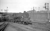 Caprotti standard class 5 no 73154 arriving at Buchanan Street in the Summer of 1965 with train from Dundee.<br><br>[K A Gray //1965]