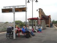 Compared to the canopy installed along the full operational length of platform 1 at Wakefield Kirkgate the re-ordered island platform 2 & 3 has been left rather sparsely appointed. Scene on the afternoon of 20 May 2013.<br><br>[David Pesterfield 20/05/2013]