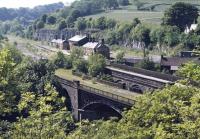 The derelict Millers Dale station on the late-lamented former Midland main line through the Peak District photographed from the south-east in the summer of 1973.<br><br>[Bill Jamieson //1973]