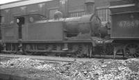 N15 0-6-2T 69150 stands alongside V3 2-6-2T 67669 in the sidings along the south side of St Margarets shed in February 1962. 69150 would be withdrawn in October that year and cut up at Inverurie Works the following February. The V3 was already 'stored', at this stage having been officially withdrawn 5 months earlier. It was cut up at Darlington Works the following month. <br><br>[K A Gray 03/02/1962]