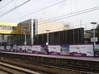The new Wakefield Westgate main station building, to the north end of the up platform, is rapidly nearing completion. This view shows the platform side exterior on 4 September 2013.<br><br>[David Pesterfield 04/09/2013]