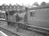 Scene at Cowes, Isle of Wight, on 16 August 1961 where  Adams class O2 0-4-4T no 30 <I>'Shorwell'</I> has recently arrived with a train from Ryde. <br><br>[K A Gray 16/08/1961]