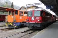 <I>Every station needs a shunter.</I> Or so it seems in Switzerland. RhB 112 is kept busy at St. Moritz on 16 September making up trains for various destinations, including Tirano in Italy. RhB 629 <I>Tiefencastel</I> is about to leave with a <I>Regio Express</I> for Landquart via Klosters. <br><br>[Mark Bartlett 16/09/2013]
