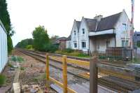 Alongside the level crossing on the A158 east of Lincoln is the former station at Langworth, seen here looking north east on 11 October 2013. <br><br>[John McIntyre 11/10/2013]