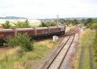 An unidentified EWS class 66 is about to take coal empties from the Millerhill direction onto the 'sub' at Niddrie West Junction in July 2011.<br><br>[John Furnevel 29/07/2011]